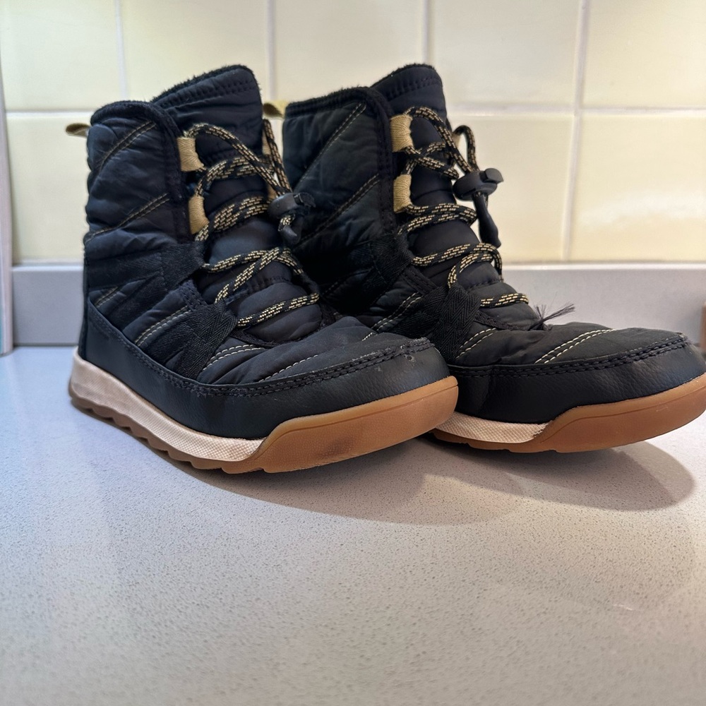 Sorel waterproof insulated snow boots.